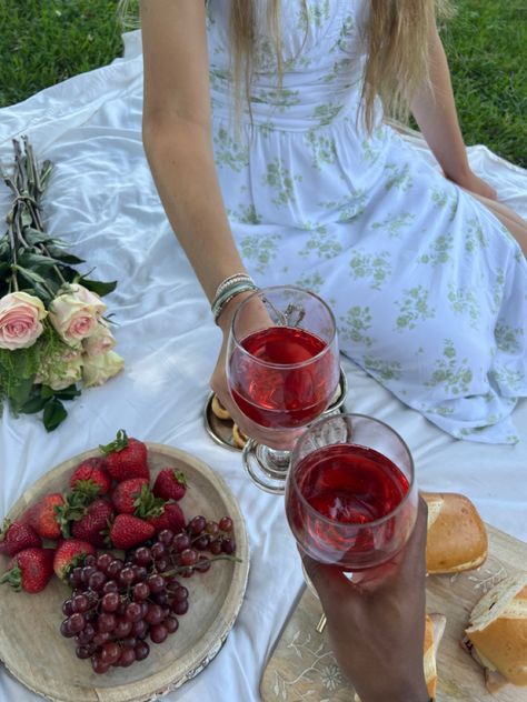 cute picnic with bf, couple goals, boyfriend, girlfriend, pink roses, fruit and sandwiches on picnic, aesthetic picnic, white sheet for picnic, green and white flower dress, interracial couple goals, cheers wine glass cups on picnic White Picnic, Couple On Picnic, Picnic With Boyfriend, Couple Picnic Date Aesthetic, Couple Picture Picnic, Wlw Picnic, Beach Picnic Aesthetic Couple, Wlw Picnic Date, Blonde Couple