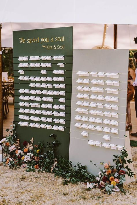 A wedding seating chart with escort cards and a floral installation for this stunning summer wedding just outside of Seattle. Photo by Seattle Wedding Photographers Jenn Tai & Co. @jenntaiandco Seat Placement Wedding, Wedding Seating Chart Cricut, Wedding Seating Chart Inspiration, Matchbook Seating Chart, Seating For Wedding Reception, Seating Chart Wedding Ideas Place Cards, Seating Chart Name Cards, Creative Seating Charts Wedding, Food Seating Chart Wedding