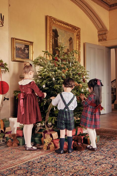 Explore heritage tartans, timeless winter checks, and beautiful Fair Isle knits. Our Christmas collection pays homage to the rich British traditions and iconic styles of centuries past, curating a timeless aesthetic. Don't miss out; shop the collection both in-store and online at pepalondon.com #pepalondon #traditionalchildrenswear #AW23 Rich Christmas Aesthetic, British Christmas Aesthetic, British Christmas Traditions, British Heritage Fashion, British Christmas, Classroom Christmas Decorations, Pretty Dresses For Kids, Baby Cinderella, Kids Christmas Outfits