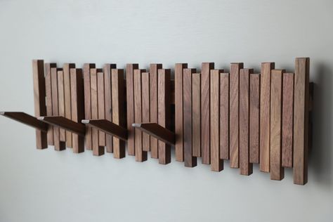 PRICES MAY VARY. 🌟HANDMADE SOLID WOOD&UNIQUE DESIGN-Modern Coat Rack designed with natural wood and handmade with a unique flip up design so the hooks stay up when not in use.（Built in magnetic design 🌟DECORATIVE & VERSATILE-Beautiful solid wood texture to match any décor and work in any room. With multiple wall hook options, these entryway storage racks can be used as wig storage, clothes or holding all your ball caps as a hat rack 🌟MODERN MINIMALIST -To keep the design minimalist and clean Coat Storage Small Space, Hanging Blankets On Wall, Entryway Wall Storage, Slat Wall Storage, Piano Coat Rack, Hardwood Wall, Coat Rack Wall Mount, Wall Hook Rack, Bathroom Towel Hooks