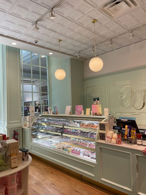 Cake Store Design Bakery Shops, Sage Green Bakery Interior, Candy Shop Design Interiors, Aesthetic Cafe Design Interior, Bakery Kitchen Aesthetic, Aesthetic Shop Interior, Candy Store Interior, Green Bakery Aesthetic, Bakery Design Interior Small Spaces