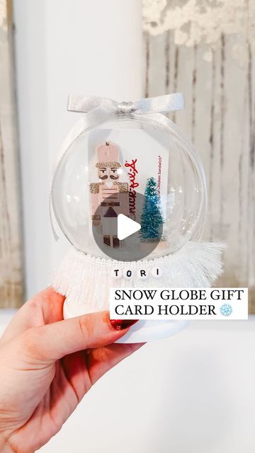 Shelby Parks on Instagram: "How to ✨zhuzh up✨ a gift card!  Comment HOLDER for everything I used to make them!   These snow globe gift card holders turned out soooo cute! I made these for my @orangetheory coaches and was obsessed with how they turned out. Here’s how to make them!   #diy #diycrafts #howto #giftcardholder #giftideas #giftidea #diygifts #diygift #lastminutegift #christmasgiftideas #giftwrappingideas #giftwrapping" Gift Card With Candy, Gift Cards Ideas For Christmas, Teacher Christmas Gift Ideas Giftcard, Gift Voucher Presentation Ideas, Diy Snow Globe Gift Card Holder, Diy Gift Card Holders Christmas, Ornament Gift Card Holder, Gift Card Ornaments Diy, Snow Globe Teacher Gift