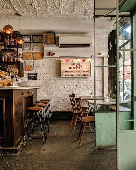 Rustic industrial cafe interiors with wooden accessories and metalwork New York Cafe Interior, Small Cafe Ideas, Small Food Shop, Coffee Shop Ceiling, Little Coffee Shop, Corporate Ladder, Industrial Cafe, Small Coffee Shop, Small Cafe Design