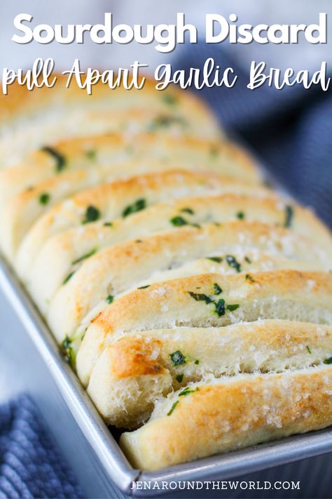 This Sourdough Discard Garlic Pull Apart Bread is delicious and buttery. The bread peels off in layers to enjoy. Serve it as an appetizer, or as a side dish with your favorite pasta dish. This twist on classic garlic bread is a great way to use up any sourdough discard you may have accumulated. Things To Make With Sourdough Starter Discard, Garlic Bread With Sourdough, Sourdough Discard Recipes Pull Apart Bread, Sourdough Garlic Bread Recipe, Homemade Sourdough Garlic Bread, Garlic Sourdough Pull Apart Bread, Sourdough Discard Pull Apart Garlic, Discard Garlic Pull Apart Bread, Sourdough Garlic Bread Foccacia Recipe