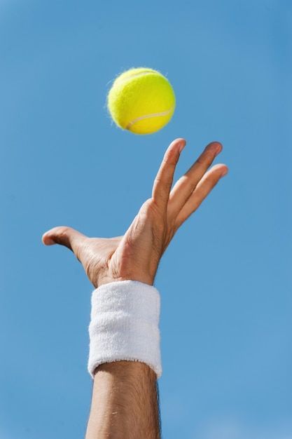 Photo serving tennis ball. close-up of m... | Premium Photo #Freepik #photo #action #outdoor-sports #tennis #competition Tennis Court Product Photography, Aesthetic Sports Pictures, Tennis Product Photography, Tennis Balls Aesthetic, Retro Sports Aesthetic, Tennis Campaign, Tennis Branding, Tennis Competition, Tennis Photoshoot