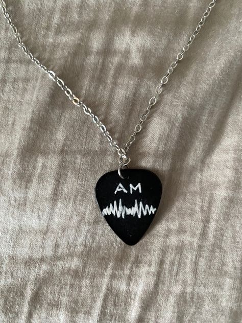 Arctic Monkeys Merch Aesthetic, Arctic Monkeys Guitar Pick, Arctic Monkeys Diy Ideas, Arctic Monkeys Necklace, Arctic Monkeys Gift Ideas, Arctic Monkeys Bracelet Ideas, Arctic Monkeys Diy, Arctic Monkeys Drawing Ideas, Arctic Monkeys Bracelet