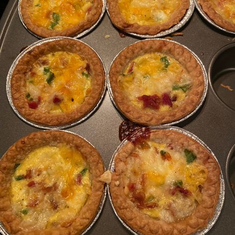 11 Mini Quiche Recipes  | Allrecipes Quiche Recipes Vegetarian, Individual Quiche, Crustless Quiche Recipes, Quiche Tarts, Mini Quiche Lorraine, Sausage Quiche Recipes, Frozen Tart Shells, Mini Breakfast Quiche, Best Quiche