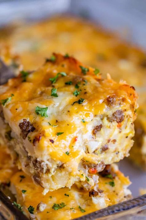 Easy Sausage Breakfast Casserole (Overnight) from The Food Charlatan. I'm in love with this Overnight Easy Sausage Breakfast Casserole! It is everything you love about breakfast wrapped up in one dish: cheesy eggs, sausage, hash browns, peppers and onions! You can make ahead or last minute. It's a great overnight option for Christmas Eve! #easy #recipe #breakfast #sausage #Christmas #Easter #Thanksgiving #withhashbrowns #eggand #overnight #makahead #hashbrown #potato #cheesy #Jimmydean #ground Easy Breakfast Casserole Sausage, Best Breakfast Casserole, Overnight Breakfast Casserole, Food Charlatan, Breakfast Casserole Easy, Breakfast Casserole Sausage, Breakfast Recipes Casserole, Easy Casserole, Breakfast Brunch Recipes