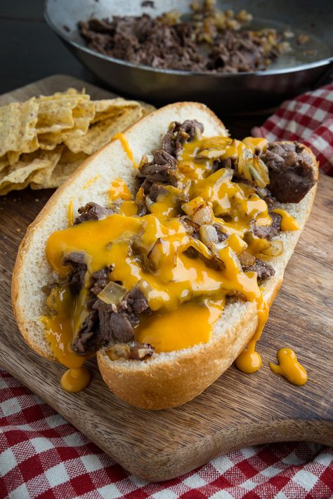 A recipe for Philly Cheesesteak Sandwiches : Tasty Philly style cheesesteak sandwiches with tender rib-eye steak, sauteed onions and plenty of cheese! Philly Cheesesteak Sandwiches, Philadelphia Cheesesteak, Cheesesteak Sandwiches, Philly Cheese Steak Sandwich, Steak Sandwich Recipes, Sauteed Onions, Cheese Whiz, Philly Cheese Steak Recipe, Steak Sandwiches