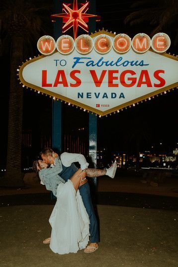 This couple ended their elopement with some epic photos at the las vegas sign, captured by las vegas wedding photographer brazen honey films. Cute Vegas Wedding Ideas, Couples In Vegas, Married By Elvis Las Vegas Weddings, Las Vegas Couple Aesthetic, Kitschy Vegas Wedding, Eloping In Vegas Aesthetic, Married In Vegas Aesthetic, Elopement In Vegas, Western Vegas Wedding