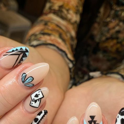 Marissas.nails on Instagram: "fun western set 🖤  . . . . . #almondnailshape #westernnailart #handpaintednailart #luminaryclarity #tammytaylorglassslipper #tammytaylorbondit #filesbylesswhiteout #cowprintnails #youngnailscourse" Western Nails With Turquoise, Gel Western Nails, Camp Nails Ideas, Fall Nail Designs Western, Cow Skull Nail Art, Western Spooky Nails, Western Chic Nails, Spooky Western Nails, Fun Western Nails