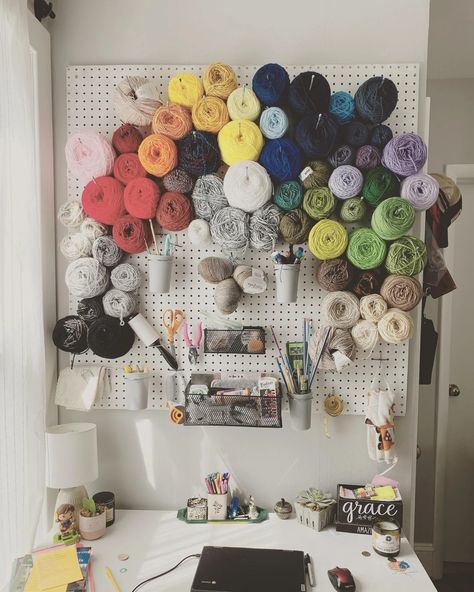 Wall Yarn Storage Ideas, Peg Board Yarn Wall, Pegboard Yarn Storage, Craft Room Crochet, Wall Yarn Storage, Yarn Pegboard, Plushie Storage Ideas Adult, Yarn Wall Storage, Organizing Yarn