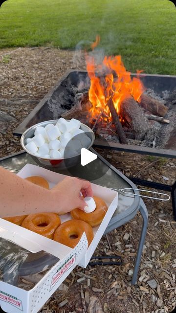 Hannah Gray | One Sweet Mama on Instagram: "Original glazed with a touch of 🔥 and a gooey marshmallow center #donuts #bonfire #marshmallows" Cooking Over A Campfire, Camp Desert Ideas, Camp Fire Cooking Ideas, Campfire Donuts Recipe, S'more Combinations, Camping Donuts Recipe, Food To Roast Over Campfire, S’mores In Cast Iron Skillet, Dessert Over Campfire