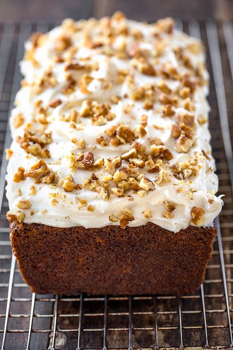 This sweet, moist carrot cake loaf is a simple twist on traditional carrot cake, filled with spices and topped with rich cream cheese frosting! | thecozyapron.com #carrotcakeloaf #carrotcakeloafrecipe #carrotcakeloafhealthy #carrotcakeloafbread #carrotcakeloafmoist #carrotcakeloafrecipeeasy #carrotcakeloafpan #carrotcakeloafwithcreamcheese Carrot Cake Loaf Recipe, Carrot Cake Bread, Carrot Cake Loaf, Carrot Banana Cake, Quick Bread Recipes Easy, Cake Loaf, Moist Carrot Cakes, Easy Carrot Cake, Cake Frosting Recipe