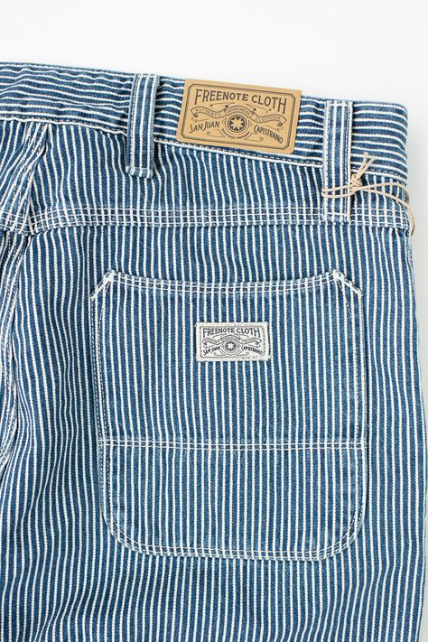 We originally ordered these last year and were so disappointed when they weren't produced. The Ortega is one of their best-fitting pants, in our humble opinion. We've seen a striped canvas in the past, but these just seem to feel and look different. These are carpenter-style pant with a double knee we're not used to seeing at the shop. It has these stunning Japanese herringbone pocket bags that they've doubled down on to create the double knee. You'll see some double-needle stitching on the front of the pants that indicates where that knee lining is located. We think it's a wonderful compromise for those who want double knee, but don't want it to be so front-facing and visible. The pre-distressing one-wash treatment they did really brings out the color and softness of this fabric. There ar Casual Striped Denim Pants, Striped Cotton Jeans With Pockets, Striped Pants With Pockets For Streetwear, Striped Cotton Pants For Streetwear, Sashiko Jacket, Cotton Wide-leg Pants With Vertical Stripes, So Disappointed, Rogue Territory, Jean Collection