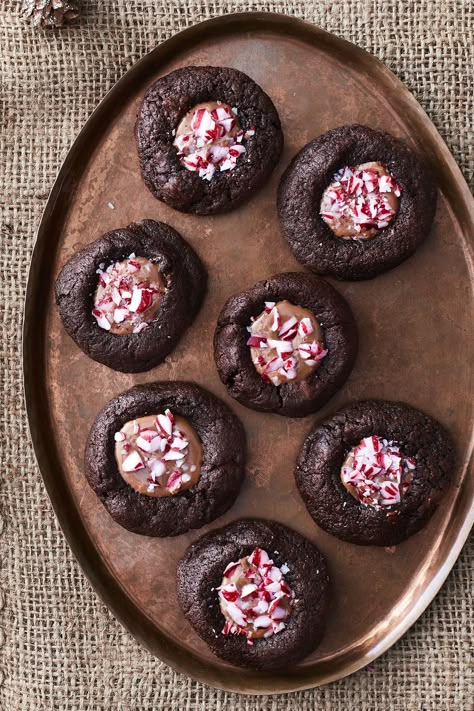 chocolate peppermint thumbprint cookies Red Velvet Sandwich Cookies, Unique Christmas Cookies, Chocolate Thumbprint Cookies, Christmas Dessert Table, Chocolate Peppermint Cookies, Thumbprint Cookies Recipe, Gifts 2022, Xmas 2022, Peppermint Cookies