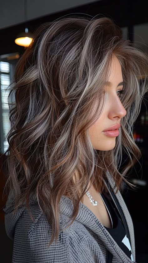 25 Silver Hair Color Ideas for an Easy, Chic Look Brown Hair With Silver Highlights, Rambut Brunette, Grey Hair Transformation, Grey Hair Inspiration, Blending Gray Hair, Gray Hair Highlights, Brunette Hair With Highlights, Silver Hair Color, Dark Hair With Highlights