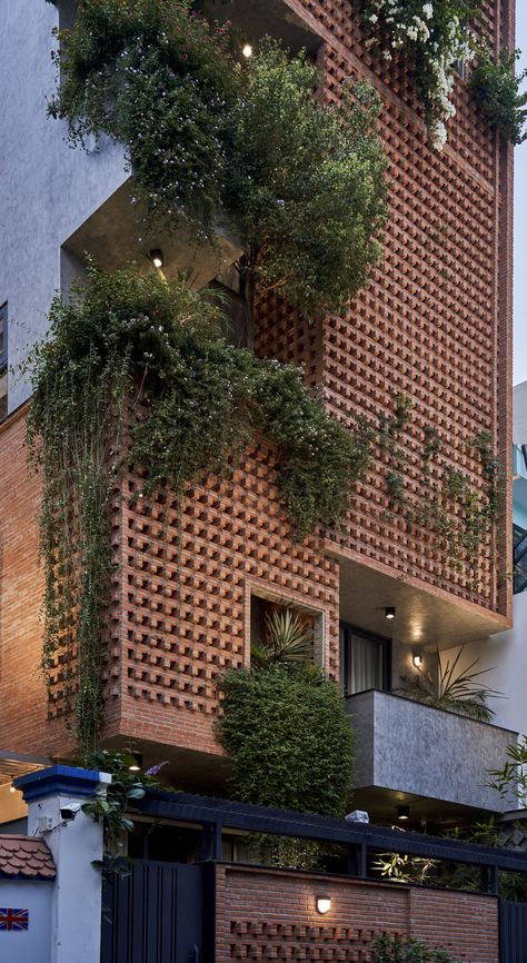 Gallery of Yoga House / Cát Môc Group - 12 | Brick facade green urban residential Modern Yoga Studio, Yoga House, Social Housing Architecture, West Facing House, Facade Ideas, House Heating, Facade Architecture Design, Small House Elevation Design, Brick Architecture