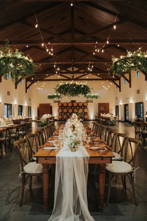 Viansa Sonoma Winery Wedding indoor reception with floating florals | Photos by JJP Studio Winery Reception Ideas, Indoor Winery Wedding, Winery Wedding Inspiration, Winery Wedding Colors, Wine Cellar Wedding Reception, Lodge Wedding Decor, Spring Winery Wedding, Candlelit Picnic, Viansa Sonoma