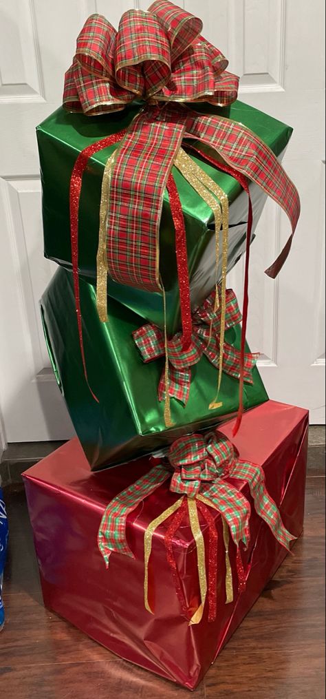 Christmas Decor Ideas With Boxes, Christmas Present Stack Decoration, Fake Present Decor, Diy Stacked Presents Decoration, Fake Christmas Gift Boxes Decor, Giant Presents Decoration, Present Tower Christmas, Stacked Presents Decoration, Stacked Christmas Boxes Decoration