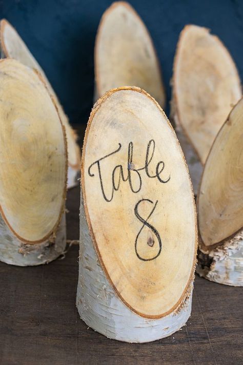 An angle cut piece of natural birch makes a great table number and more. Rustic Wedding Decorations, Winter Wedding Decorations, Stella York, Forest Wedding, Wedding Table Numbers, Rustic Wedding Decor, Diy Wedding Decorations, Wood Slices, Romantic Weddings