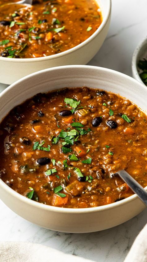 This black bean and lentil soup is packed with nourishing ingredients and is a must-make on cold days! It is perfect for loading up on nutritious vegetables, fiber, and protein. Plus, it's super flavorful and very easy to make. Vegetable Soup Beans, Black Bean And Lentil Chili, Only Veggie Meals, Finish Food Recipes, Lentil Black Bean Chili, Black Bean Mediterranean Recipes, Basic Lentil Soup, Jewish Lentil Soup Recipe, Best Legumes To Eat