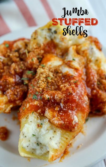 Olive Garden introduced new jumbo features and one was the Jumbo Stuffed Shells. They're stuffed with four cheeses and then topped with marinara and alfredo sauce. And they are delicious!!! But you don't have to go to Olive Garden to get them - you can have them in your own home! #olivegarden #copycatrecipes #stuffedshells Stuff Noodles Shells, Giant Stuffed Shells Recipe, Stuffed Shells With Cream Cheese Recipe, Meat Sauce Stuffed Shells, Jumbo Shells Recipe Beef, Stuff Jumbo Shells, Spaghetti Stuffed Shells, 3 Cheese Stuffed Shells, Stuffed Jumbo Pasta Shells Cream Cheese