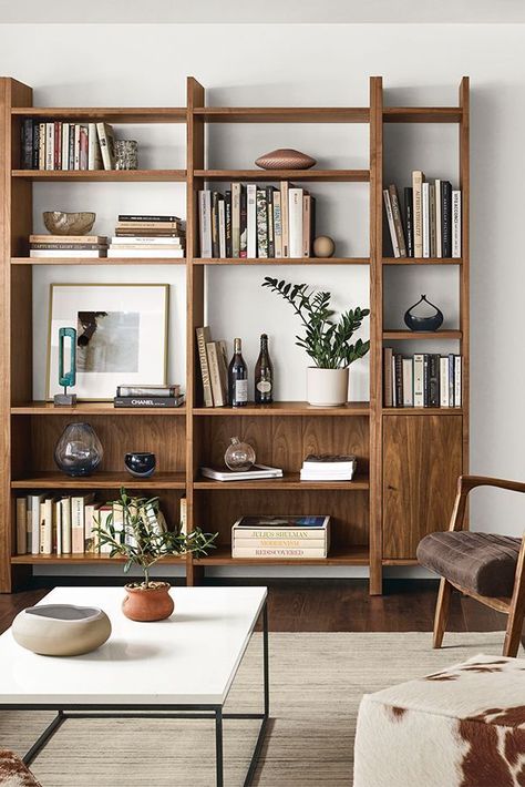 Functional and elegant – a well-chosen contemporary designer bookcase allows for the convenient storage of books and collectables whilst creating a sleek centrepiece. #bookcase #bookshelf #Bookshelves #bookcaseidea #bookshelfidea #Bookshelvesidea #bookcasedesign #bookshelfdesign #Bookshelvesdesign #luxuryfurniture #luxuryinteriordesign #interiordesign #designtrends #luxurydesign #interiordesignideas #designideas #luxuryinteriors #furnitureideas Small Living Room Furniture, Modern Wall Units, Furnitur Ruang Keluarga, Living Room Wall Units, Bookshelves In Living Room, Modern Bookcase, Room Shelves, Modern Shelving, Living Room Bookcase