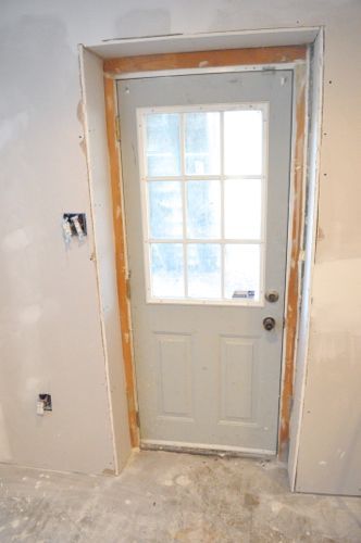 How To Install An Exterior Door, Basement Exterior Door, Basement Exterior, Replace Exterior Door, Trailer Redo, Basement Door, Concrete Foundation, Basement Doors, Plumbing Pipes