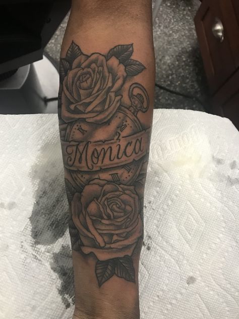 Rose Clock Ribbon Name tattoo for MOM Tattoo With Roses And Name, Name Tattoo With Roses For Men, Name Half Sleeve Tattoo, Forearm Tattoo With Roses, Mom Name Tattoo Ideas Men, Name Tattoo With Roses Forearm, Forearm Tattoo Moms Name, Momma Name Tattoo Ideas, Tattoo Ideas Mom Name