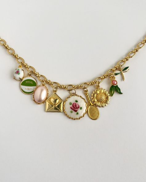 custom charm necklace combos!!!! 🌷🍊🦋🐚👒 #vintagestyle #customjewelry #charmnecklace #shabbychic #trendingfashion #summerjewelry #maximaliststyle Cheap Themed Charm Necklaces, Cheap Themed Charm Necklace, Cheap Vintage Charm Necklaces, Charm Necklace Aesthetic, Unique Multicolor Charms Necklace, Whimsical Charm Necklaces With Dangle Charms, Necklace Combo, Maximalist Style, Custom Charm Necklaces