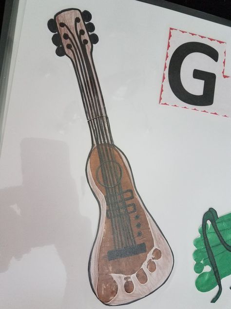 G is for guitar G For Guitar Craft, Guitar Footprint Art, Letter G Footprint Craft, Footprint Guitar, Feelings Activities Preschool, Nicu Crafts, Fathers Gifts, Baby Art Crafts, Guitar Crafts