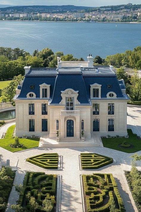 High angle view of a modern french mansion with dark blue roof ornate facade front garden with chrub maze marble pathways big river in the. Let’s reveal the charming features, quirky details, and luxurious elegance of French mansions. Luxury House Mansions Dream Homes, French Villa Exterior, Modern French Mansion, French Chateau House Plans, House With Blue Roof, 12 Bedroom House, Villa House Design, Modern French Chateau, Big Mansion