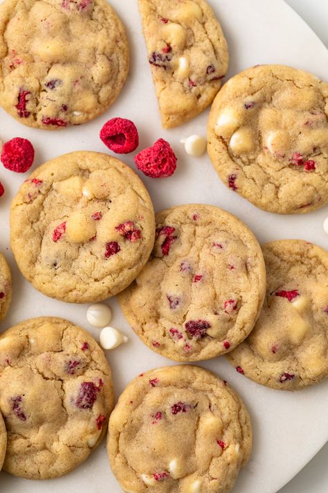 Flavorful and perfectly chewy, these White Chocolate Raspberry Cookies are perfect for weekend baking. They can be ready in 30 minutes with no chilling required! White Raspberry Cookies, Gooey Raspberry White Chocolate Cookies, Cookies Raspberry White Chocolate, Baking White Chocolate, White Chocolate Raspberry Macadamia Nut Cookies, Copycat Subway Raspberry Cookies, Cookies With Raspberries, Raspberry White Chocolate Cookie, Subway White Chocolate Raspberry Cookies