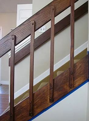 80s Staircase Makeover, 80s Entryway, 70s Staircase Makeover, Entryway Closet Door, Diy Stair Railing Cheap, Wooden Railings For Stairs, Dark Wood Stairs, Entryway Update, Banister Makeover