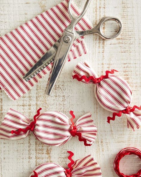 craft made from striped red and white fabric made to look like oversized peppermints Red Christmas Ornaments, December Crafts, Easy Holidays Crafts, Peppermint Christmas, Homemade Christmas Decorations, Christmas Craft Projects, Christmas Crafts To Make, Easy Christmas Crafts, Easy Christmas Diy