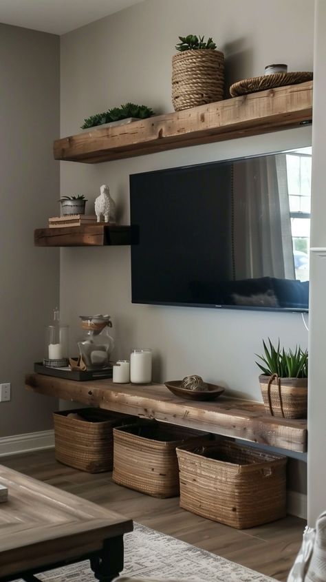 TV Wall Decor Ideas to Elevate Your Living Room - Remodr Tv Wall Hanging Shelves, Shelving Under Tv Mounted Tv, Wall Shelves By Tv, Living Room Tv Wall Apartment, Wall Shelves Living Room Above Tv, Rustic Tv Shelf, Wall Next To Tv Decor, Mounted Tv Living Room Decor, Floating Shelves Around Mounted Tv