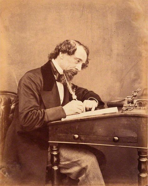 Charles Dickens writes with a quill at his desk in 1858. He wrote everything by hand, from 9am to 2pm every day. Writing inspiration. Patrick Modiano, Patricia Highsmith, Little Dorrit, Writing Images, Bleak House, English Writers, Margaret Mitchell, Oliver Twist, Penguin Classics