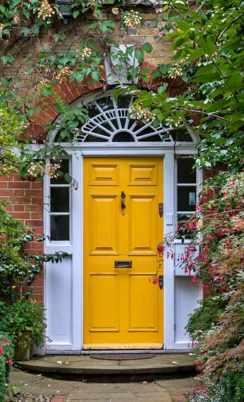 Embrace Sunshine Vibes with a Vibrant Yellow Front Door Yellow Door Aesthetic, Yellow Entrance Door, Yellow Front Door Red Brick House, Yellow Doors On Houses, Yellow Door Exterior, Yellow Front Door White House, Yellow House Aesthetic, Mustard Yellow Front Door, House With Yellow Door