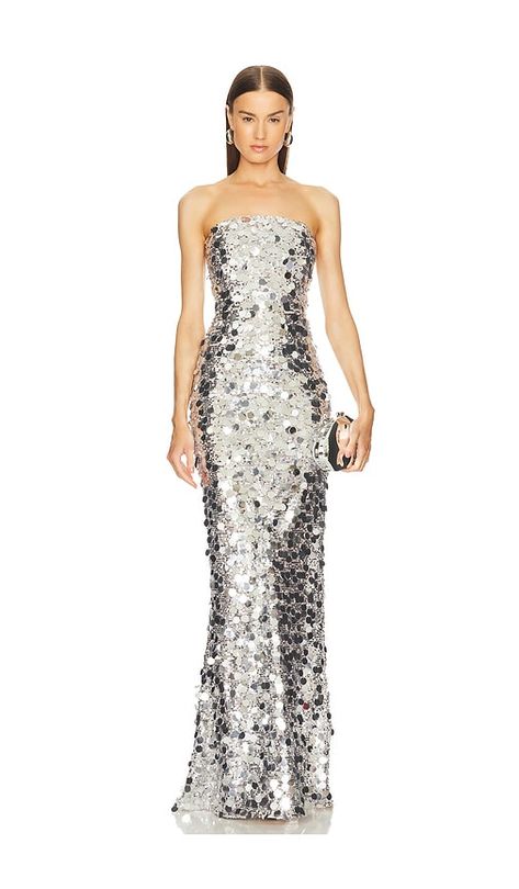 Find BRONX AND BANCO Farah Strapless Gown In Metallic on Editorialist. Bronx and Banco Farah Strapless Gown in Metallic Silver. - size L (also in M, S, XS) Bronx and Banco Farah Strapless Gown in Metallic Silver. - size L (also in M, S, XS) Self: 100% polyester Lining: 95% polyester 5% elastane. Made in China. Dry clean. Partially lined. Exposed back zipper closure. Boned bodice. Sequin embellished fabric. Neckline to hem measures approx 58 in length. BROR-WD691. BB-20-010. Launched in 2009, Bronx and Banco encapsulates a sophisticated, chic and sexy design signature with a playful sensibility that reflects the impeccable style of the label's Founder and Creative Director, Natalie DeBanco. With a strong love of all things sartorial and a rich family history that is immersed within the inte Unique Mini Dresses, Dress Beach Outfit, Embellished Fabric, Bronx And Banco, Career Girl, Rich Family, Fashion Gowns, Column Gown, Stage Costume