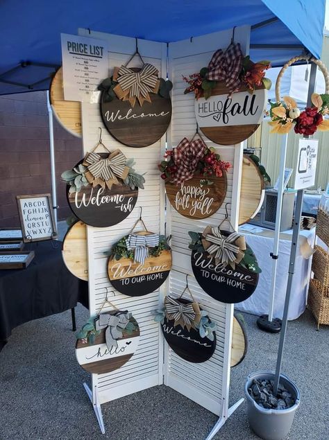 Hanging Sign Display Craft Fairs, Sign Display For Craft Show, Holiday Market Vendor Booth Ideas, Porch Leaner Display Craft Show, Craft Booth Wall Ideas, Christmas Vendor Fair Ideas, How To Display Door Signs At Craft Show, Craft Displays Booth, Crafts Fair Display Ideas