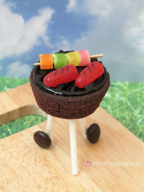 [Advertisement] Your video will begin shortly: 0:04 REPORT THIS AD 2.  Using the black edible marker, make little grill marks on the red Mike & Ike candies so they look like hot dogs. Place Grill Cupcakes, Fire Cupcakes, Mini Brownie Bites, Bbq Desserts, Grilling Hot Dogs, 3 Ingredient Desserts, Mini Brownies, Grilled Desserts, Brownie Bites