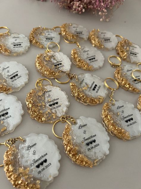 [Ad] Wedding Keychain Favors | Bridal Shower Keychain Favors | Elegant Wedding Favors | Unique Wedding Gifts | Bridesmaid Gift Ideas | Party Shower Favors Very Elegant Gold Wedding Keychains Are The Cutest Favor Idea On Your Special Day! These Are So Adorable, Good Quality Magnet And Sticker. I Am Pretty Sure That Your Guests Are Going To Ask Where Did You Get This From! For This Listing Minimum Quantity Order Is 79 Pieces. I Ship With Ups, Tnt And #rusticweddingfavorsforguests Wedding Keychain Favors, Keychain Favors, Wedding Favors Unique, Wedding Keychain, Wedding Favours Magnets, Bridesmaid Gift Ideas, Wedding Favors And Gifts, Resin Crafts Tutorial, Elegant Wedding Favors