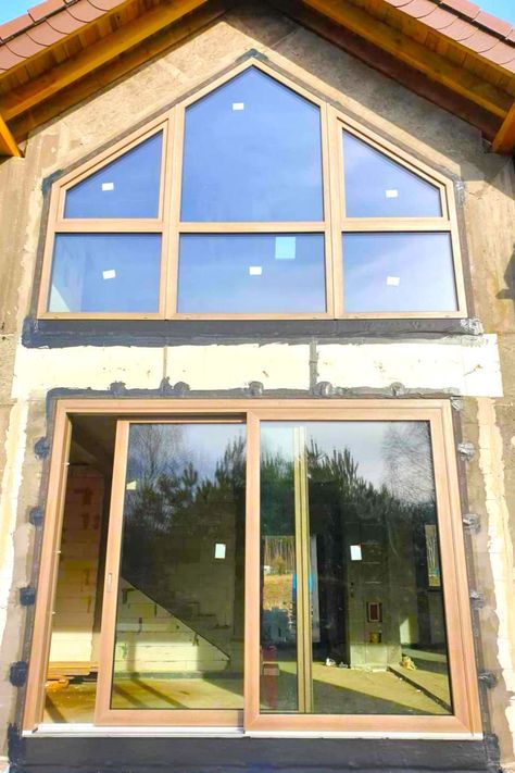 One of our recent realizations😍 Structures in sophisticated shapes are our specialty. Below the large triangular window, the Smart Slide patio door system has been installed. The color is deceptively reminiscent of wood - Turner Oak Malt, but these are warm vinyl windows🤩 Oak Windows, Vinyl Windows, Wood Turner, Patio Door, Window Vinyl, Patio Doors, Energy Efficiency, House Design, Patio