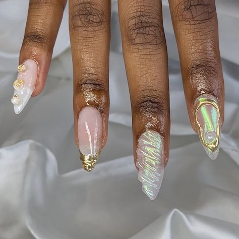 So cutsieeee 🧜🏾‍♀️🐚 - Book your next nail appt today! @bratcrylix - Not able to book? Order your next custom made press on set @bratcrylix with the order form in my bio! Check "press ons" highlight for more info🤗 - Almond nails , gel-x nails , nail art , chrome nails , 3d nail art , white nails , French tip , gold , nail design , nail charms #atlnails #atlnailtech #atlnailsalon #atlantanails #atlantanailsalon #atlantanailtech #cummingganails #cummingganailsalon #cummingnails #cu... Acrylic Nails Simple Almond, 3d Nail Art Simple, Almonte Nails, Almond Nails Designs 3d Gel, White French Tip Nails With 3d Gel, 3d White Nails, Gold Chrome Nail Tips, 3d Gel Nail Art Design, Nails With Pearl Charms