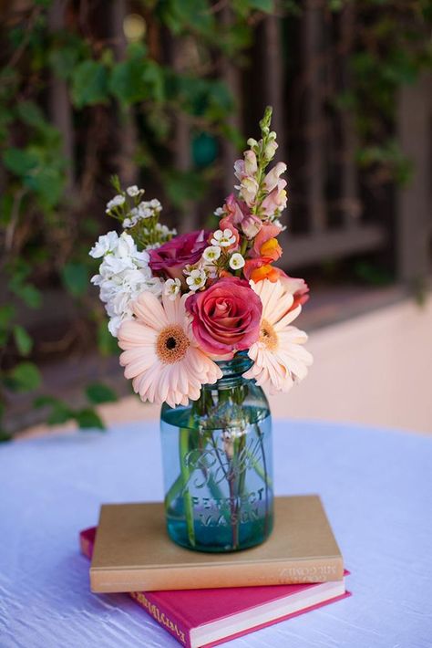 mason jars wedding centerpieces blue glass with bright flowers morins Wedding Centerpieces Mason Jars, Blue Wedding Centerpieces, Mason Jar Flowers, Wine Bottle Diy Crafts, Mason Jar Wedding, Mason Jar Centerpieces, Deco Floral, Center Pieces, Mason Jar Diy