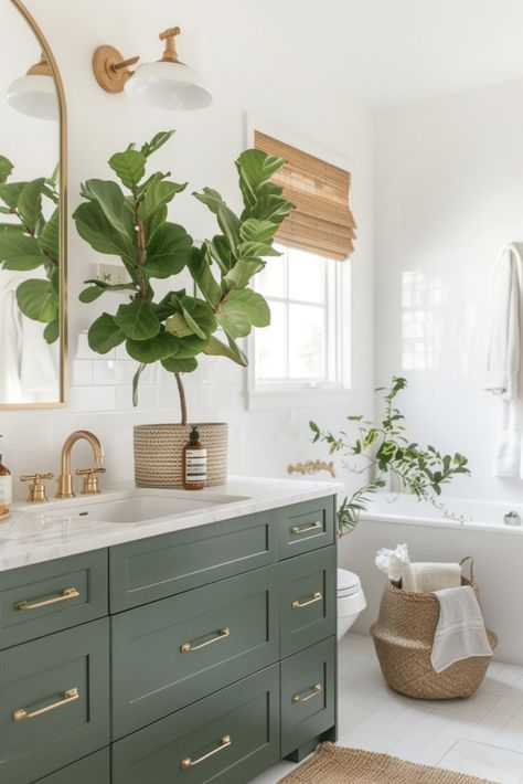 27 Luxurious Gold Bathroom Ideas You’ll Love Bathroom Decor Green Cabinets, Green Gold And Wood Bathroom, Deep Green Bathroom Vanity, Green Cabinets Bathroom Ideas, Green On Green Bathroom, Grey Green Bathroom Vanity, Sage Master Bath, Bathroom Remodel Green Vanity, Olive Green And Gold Bathroom