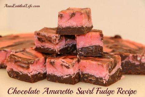 A marvelous blending of chocolate, vanilla and almond combine to make this lush and decadent Chocolate Amaretto Swirl Fudge Recipe. Amaretto Fudge, Amaretto Deserts, Amaretto Fudge Recipe, Amaretto Brownies Recipe, Amaretto Fudge Easy, Cherry Amaretto Fudge, Amaretto Freeze Recipe, Desserts With Amaretto, Homemade Fudge Recipes