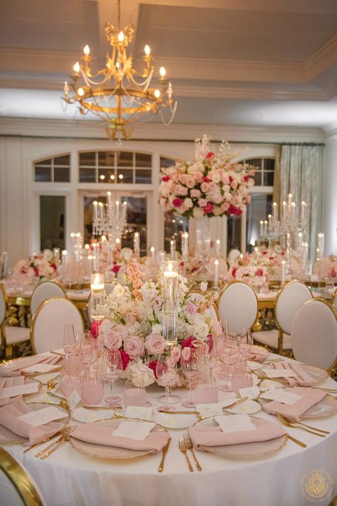 Kristi & Alex’s stunning country club wedding featured pink and white wedding decor. The outdoor ceremony included large pink and white floral arches draping over a mirrored aisle. The wedding reception featured gold and crystal decor with pink & white centerpieces, candelabras and pink glassware. | Floral, Decor, Production, Rentals: Royal Luxury Events / Photo: Jessica Frey Photography | wedding table centerpieces, low floral arrangements, wedding reception decor, pink wedding flowers, elegant Flowers On Candelabras Wedding, Pink And White Engagement Decor, Pink Quince Decorations Table Settings, Pink Inspired Wedding, Wedding Decorations Pink And Gold, Elegant Pink Birthday Party, Pink Rose Wedding Theme, Pink Rose Wedding Centerpieces, Pink And White Engagement Party