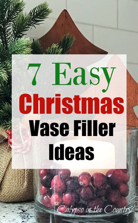 Keep your Christmas decorating simple this year with some easy DIY Christmas decor. Work on one vignette at a time. Fill some vases or glass containers with items from the grocery store or from your Christmas decoration collection. Christmas vase filler ideas include, candles, cranberries, nuts, pine cones, Christmas ornaments and more! See all the creative vase filler ideas on the blog! Vase Inside A Vase, Clear Glass Vase Fillers, Christmas Table Centerpieces Ideas Vases, Christmas Decor Ideas Glass Vase, Christmas Berries In Vase, Christmas Flower Vase Ideas, Christmas Decorations In Glass Vases, Christmas Decor In Glass Vase, Glass Candle Holders Decorating Ideas Christmas